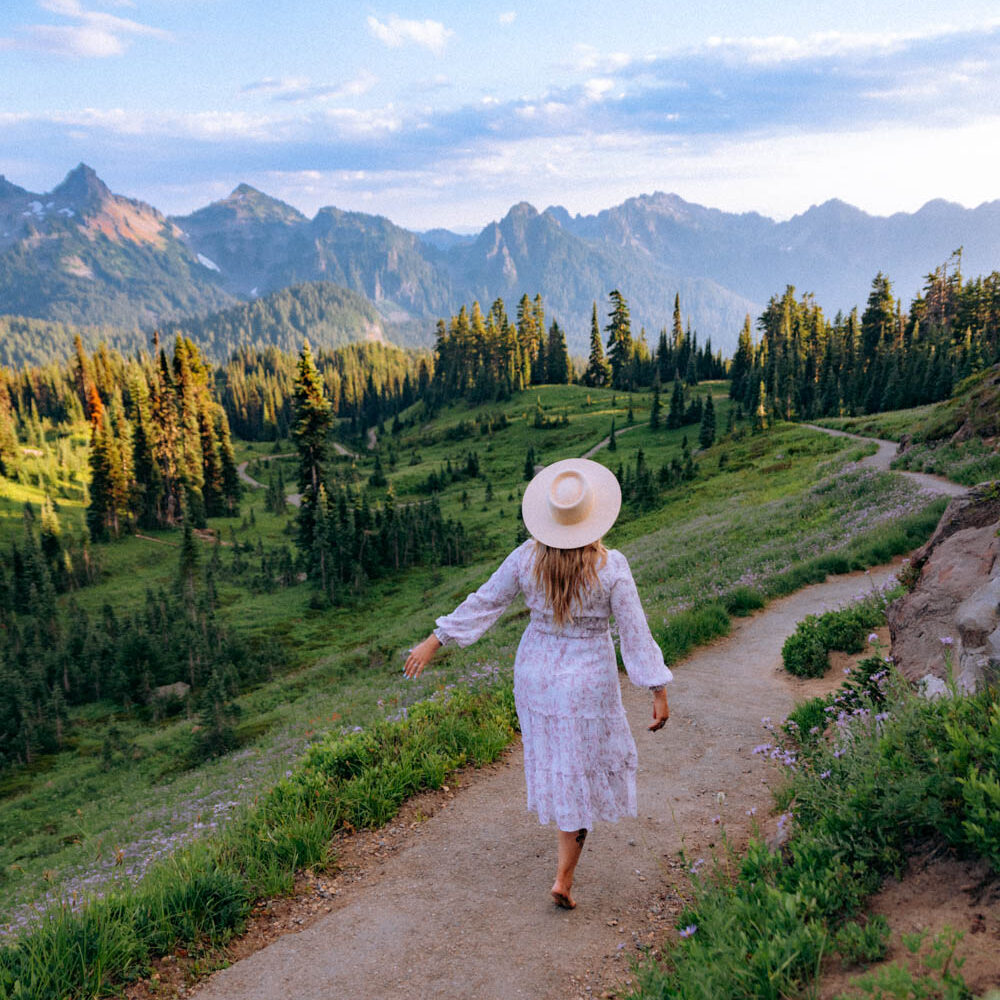 woman on hiking trail in dress